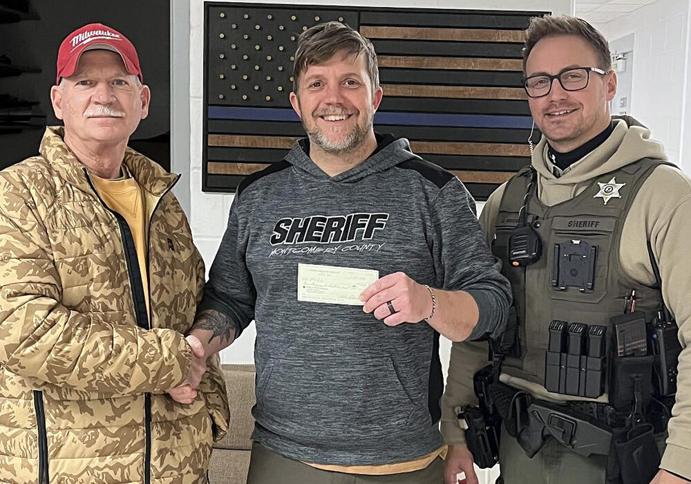 On behalf of the Cahokia Creek Dirt Riders, Steve Pickerill presented Sheriff Holshouser with a donation to the Montgomery County Sheriff's Office. The funds will be used in support of operations at the Sheriff's Office.